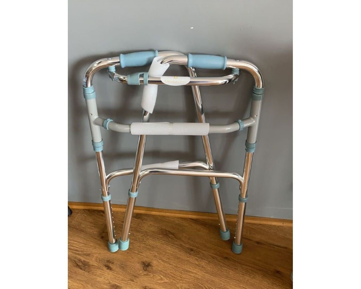 Folded aluminium walker with cushioned blue hand grips